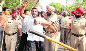 Farmer activists being arrested by the police at Amritsar railway station on Thursday.
