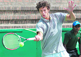 Romain Sichez of France plays a shot during the ITF Mens Future Tennis Tournament 2010 at the CLTA, Sector 10, on Friday.