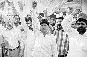 Bidders protest against the postponement of the cattle auction fair at the office of the Rural Development and Panchayat Department at Mohali on Friday.