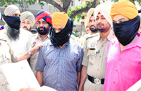 The accused being taken to a court at Rajpura on Friday.