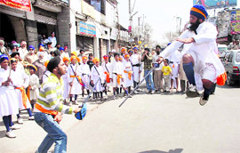 Gatka being performed during the Jagriti Yatra in Dehradun on Friday.
