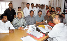 A delegation of people from Kehri village meets Chief General Manager, Jal Sansthan, to protest erratic water supply in their area in Dehadun on Friday.