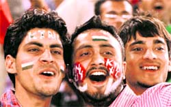 Spectators enjoy every moment of the IPL cricket match at PCA Stadium in Mohali on Saturday. Tribune photo: Pradeep Tewarisa