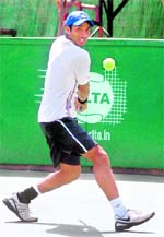 Karan Rastogi plays a shot during the singles final of India 2 Futures ITF Mens Circuit held at the Chandigarh Lawn Tennis Association stadium on Saturday. Tribune photo: Manoj Mahajan