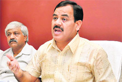 Harak Singh Rawat addresses mediapersons in Dehradun on Saturday.
