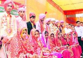 The Maa Bhagwati Club solemnised the marriage of eight girls of economically weaker sections of society on Sunday. They were also given necessary home articles. Photo: Inderjeet Verma