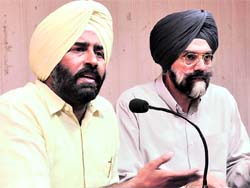 Pargat Singh, Sports Director, Punjab, and Dr Manmohan Singh, Chairman, Medical and Anti-Doping Committee, World Kabaddi Cup, address a press conference in Ludhiana on Sunday. A Tribune photograph