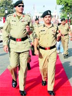 Mohammad Aquil (right), DIG, BSF, accompanies Brig Muhammad Yaqub Khan, Director-General, Pakistan Rangers, to the biannual meeting at the Attari joint check post on Sunday. Tribune photo: Vishal Kumar