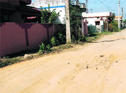 Dilapidated condition of a road at Saraswati Vihar in Dehradun. 