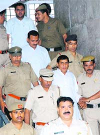 Three of the guilty, Baru, Gurdev and Suresh, being produced in a court in Karnal