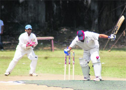 A batsman gets rapped on the pads during a match at the 3rd All-India Uttarakhand Cup Cricket Tournament in Dehradun on Tuesday. 