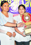Winners of a declamation contest with their trophy at LHRP College of Law, Sirsa on Tuesday.
