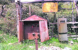 Naked wires seen in one of the main switch and fuse boxes installed at a low height in Palampurs Ghuggar area.