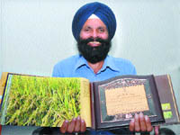 A progressive farmer Manohar Singh, of Bhogpur, shows the award he received from the union agriculture ministry
