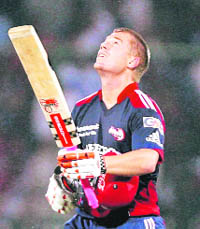 Delhi Daredevils David Warner looks towards the sky on completing his century against Kolkata Knight Riders in New Delhi