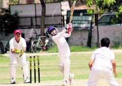 A batsman of Guru Nanak Public School plays a shot during a match at Banyan Tree School in Chandigarh on Wednesday. Tribune photo: Parvesh Chauhan
