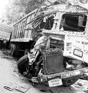 Mangled remains of the truck that met with an accident on the Zirakpur-Patiala highway at Zirakpur on Wednesday. 