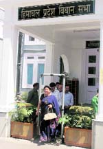 Sarveen Choudhary, social justice and empowerment minister, coming out of the Himachal Pradesh vidhan sabha after attending the session at Shimla on Wednesday. Tribune photo: Amit Kanwar