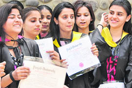 Girls in a cheerful mood after receiving their degrees during the annual convocation at the Government College for Women in Ludhiana.