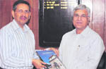 Uttarakhand Chief IT Commissioner Satpal with Director- General of Police Subhash Joshi inDehradun