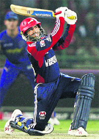 Karthik plays a shot on Thursday.