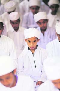 Thai Muslim boys pray at an Islamic school in the village of Lam Mai, in the troubled Yala province in southern Thailand