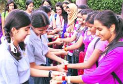 Students of Indian High School, Dubai, tie friendship bands to students of The Gurukul at Sector 20, Panchkula