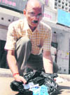 A man with the tablets seized at Sector 23 in Chandigarh 