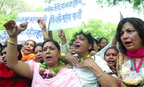 Women activists of Delhi BJP protest against the Delhi government for hiking the prices of food items in New Delhi