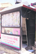 Wires hang precariously at a police beat box in Mussoorie.