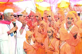 Kashmiri children participate in a yajna during a Yagno Pavit function in Jammu