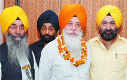 Gurdev Singh Batalvi (centre), whose candidature against SGPC chief Avtar Singh Makkar was announced recently, in Jalandhar on Thursday. 