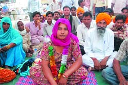 Malkiat Kaur on an indefinite hunger strike outside the Mini-secretariat in Bathinda on Friday. Tribune photo: Pawan Sharma