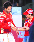 Sidharth Mallya (son of Vijay Mallya) shakes hands with Preity Zinta.