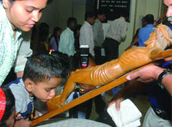 Devotees pray at a church on the occasion of Good Friday in New Delhi.