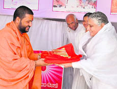 Swami Rameshwar Shastri of Shri Rameshwar Ashram being felicitated by Brahm Kumari Premlata Behan in Haridwar on Friday.