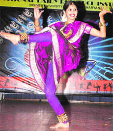 A student performs during the inauguration of the 15th All- India Inter- University Youth Festival, Reverie 2010, at the NDRI in Karnal on Friday.