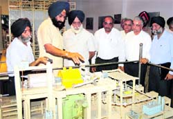 PSEB chairman HS Brar (third from left) at the Guru Gobind Singh Super Thermal Power Plant at Ropar on Friday. A Tribune photograph