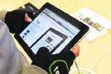 A customer tries out an iPad during its launch at the Apple Store in New York