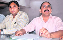Shekhar Mamgain, president of the Parents Federation, addresses a press conference in Dehradun