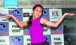 A girl performs at an audition in Dehradun