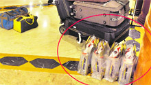 Liquor bags (encircled) kept alongside players luggage at a hotel in Ludhiana on Friday.