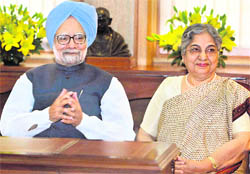 Prime Minister Manmohan Singh and his wife Gursharan Kaur give their family details to census officials during the first phase of Census 2011, in New Delhi on Saturday.