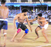 Players from India and USA in action during the inaugural game in Patiala on Saturday. 
