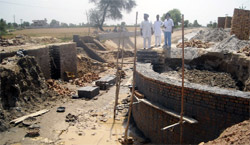 Regulator under construction to divert more water from Malukpura distributary to home turf of state CM Parkash Singh Badal .