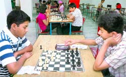 Players in the final round of the chess championship at St Xaviers School, Chandigarh, on Sunday. Tribune photo: Parvesh Chauhan