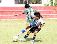A match of the 2nd BS Negi Memorial Football Tournament being played 