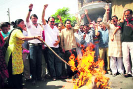 Members of the Panun Kashmir hold a demonstration in support of their demands in Jammu on Sunday.