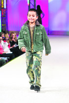Kids walk the ramp for designer Ritu Beri during the Wills Lifestyle India Fashion Week-2010 in New Delhi. 