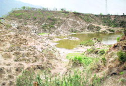 A view of the pond that fulfils the water requirement of Samlah village in Anandpur Sahib.